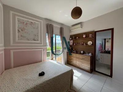 Suíte da casa de 3 quartos à venda no Silvestre, em Viçosa/MG.